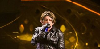 Rkomi al Festival di Saremo con un modello di Premiata rkomi premiata