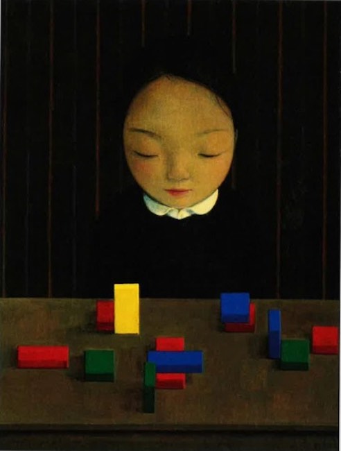 girl with toy bricks