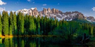 La valle dei sogni, un’oasi di laghi arcobaleno e boschi incantati: ti aspetta tra le montagne imponenti Lago di Carezza