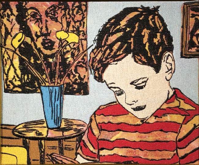boy with striped shirt embroidery on hand